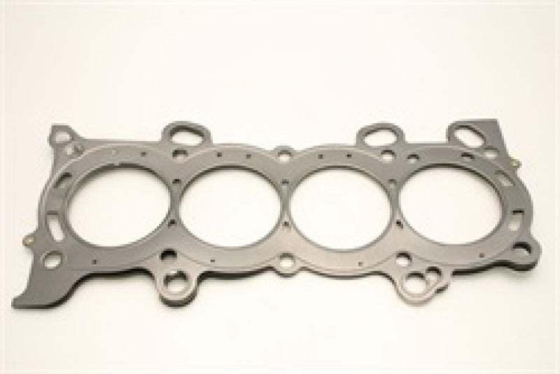 Cometic Honda K20 K24 86mm MLS head gasket in .030 inch thickness, showing the gasket's detailed design and material.