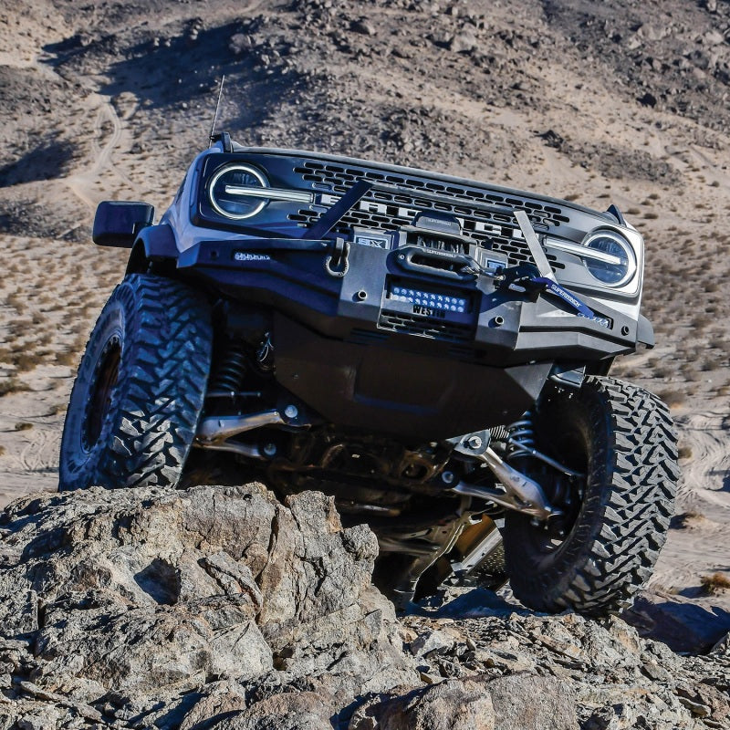 Westin textured black skid plate for 2021-2023 Ford Bronco, designed to protect the undercarriage of off-road vehicles.