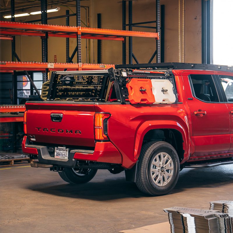 Cali Raised LED Overland Bed Rack for 2024+ Toyota Tacoma long bed, mid-height roof rack with sturdy metal construction.