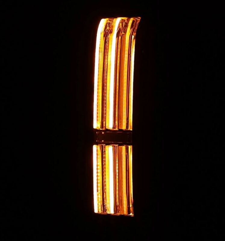 AlphaRex 22-24 Toyota Tundra NOVA-Series prismatic LED tail lights in black and red, showcasing modern headlight design and LED illumination.