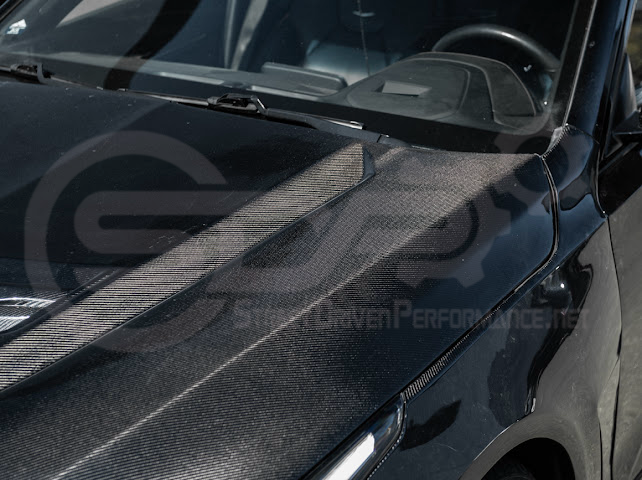Black wing-style carbon fiber vented front hood for 2020+ Cadillac CT4, CT4-V, and CT4-V Black Wing by Street Driven Performance