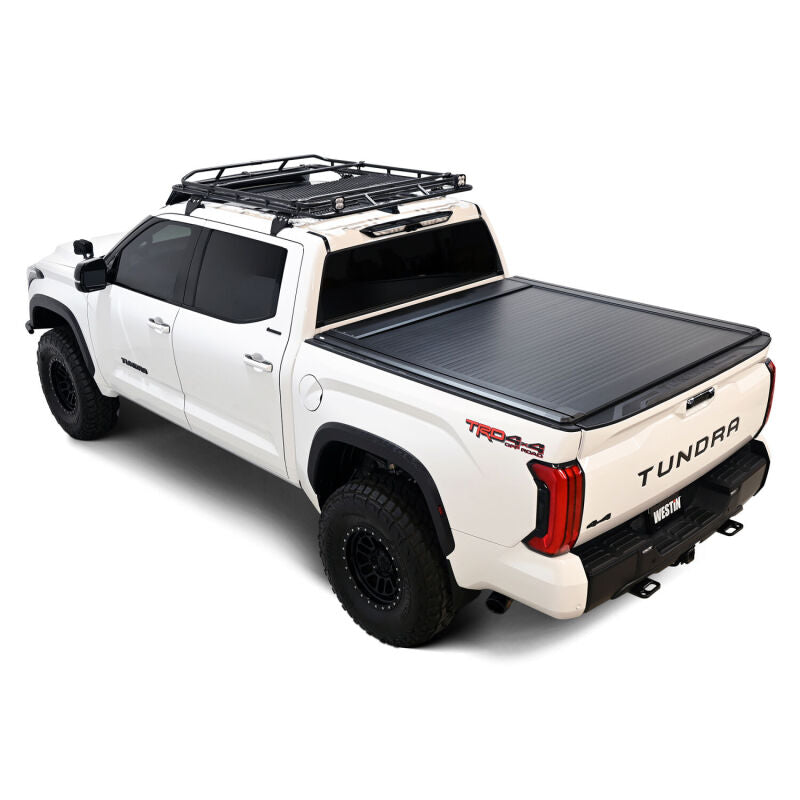 Westin manual retractable roll-up tonneau cover for 2022-2026 Toyota Tundra 5.5ft bed, black, shown installed on truck bed