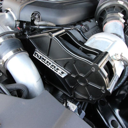 KraftWerks supercharger kit for 2015-2017 Ford Mustang 5.0L Coyote engine, showing the boost compressor and mounting components.