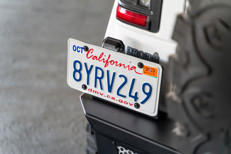 Steel rear bumper for 2018 Jeep Wrangler JL by DV8 Offroad, featuring the MTO Series design with optional tire carrier attachment.