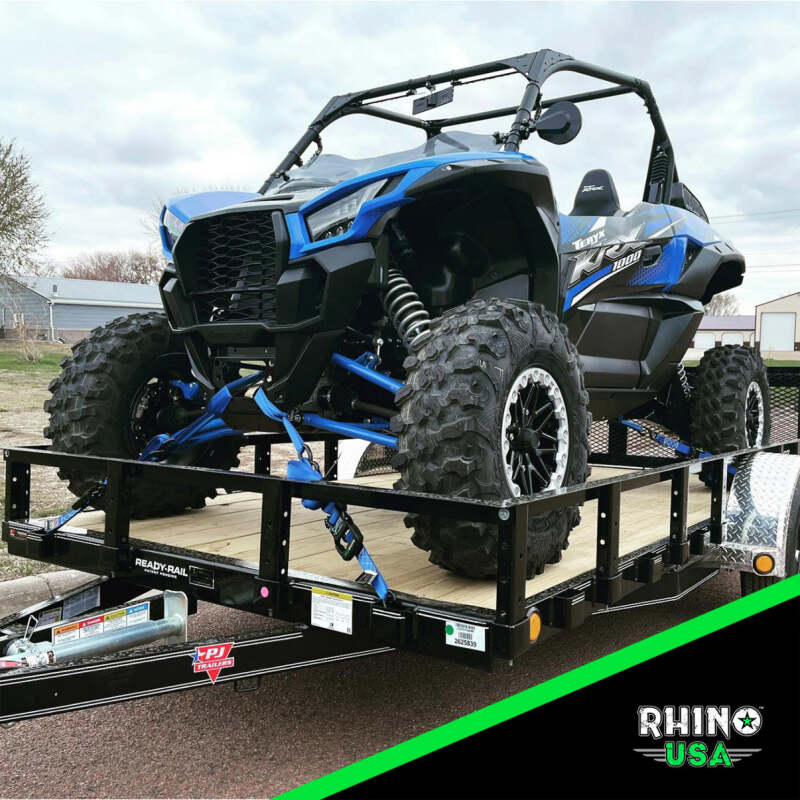Rhino USA heavy-duty cargo ratchet tie-downs, 4-pack in blue, 1.6-inch by 15-foot straps with metal hooks for securing loads.