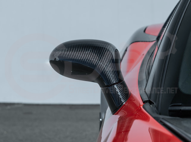 Set of four dry carbon fiber side mirror cap covers for 2005-2013 Chevy Corvette C6, tape-on style by Street Driven Performance.