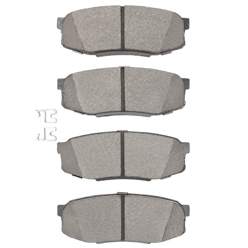 R1 Concepts Lexus LX570 rear ceramic brake pads, OE type, shown with metal backing and brake pad friction surface.