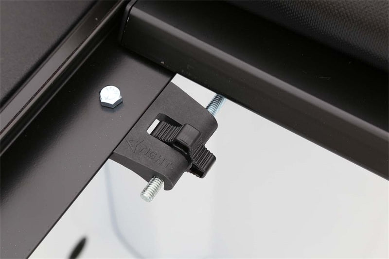 Access Limited roll-up truck bed cover on a 2004 Ford F-150 8ft bed, exterior truck bed accessory for enhanced protection and style.