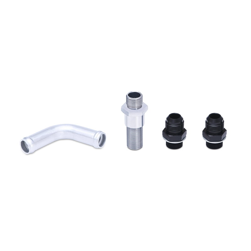 Mishimoto 14-16 Ford Fiesta ST thermostatic oil cooler kit in silver with hoses and mounting hardware installed