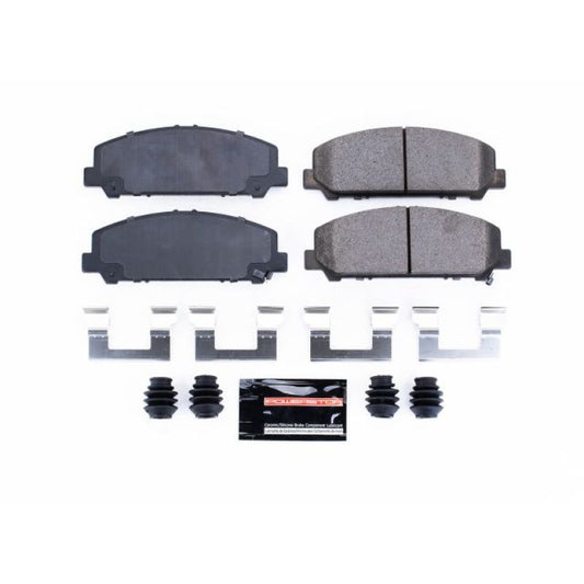 PowerStop Z23 Evolution Sport brake pads with hardware for 2005-2010 Infiniti QX56, high-performance front brake components.