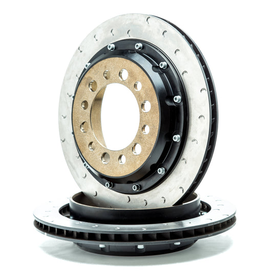 Alcon Jeep JK rear brake upgrade kit with red 4-piston calipers, 355x22mm rotors, and 6x5.5-inch hub for big brake performance.