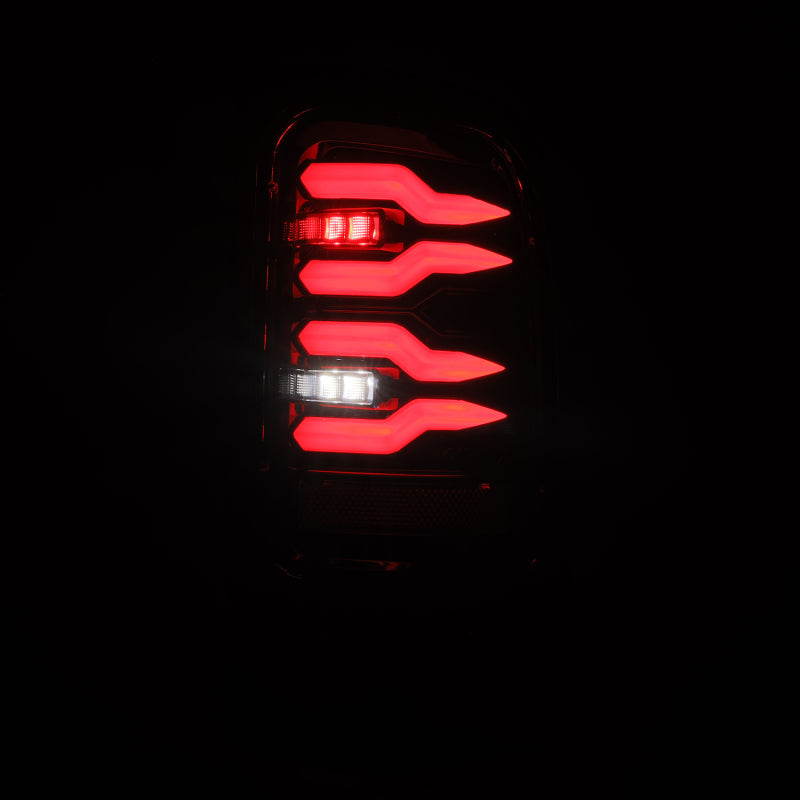 AlphaRex LUXX-Series LED tail lights for Dodge Ram 1500/2500/3500 94-01 in Alpha-Black, showcasing sleek LED design.