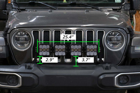Diode Dynamics Jeep JL SS5 4-Pod CrossLink grille lightbar kit with yellow and combo LED lights on a Jeep grille.