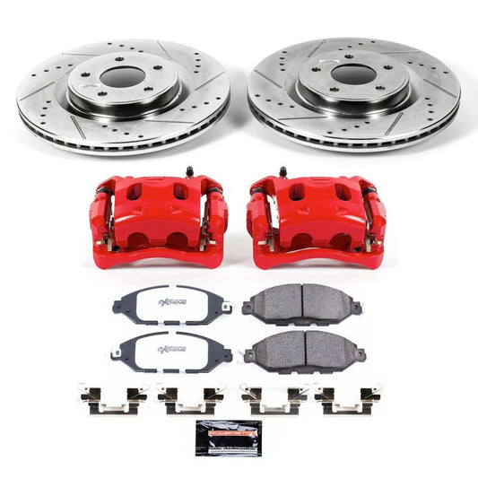 PowerStop brake calipers from the Z36 Truck & Tow Kit installed on a Nissan Pathfinder front suspension, showcasing performance components.