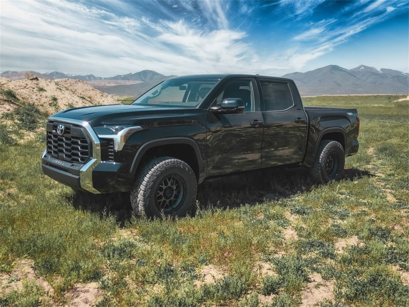 Tuff Country 2-inch leveling kit installed on a 2022 Toyota Tundra and 2023 Sequoia, showing the front suspension upgrade.
