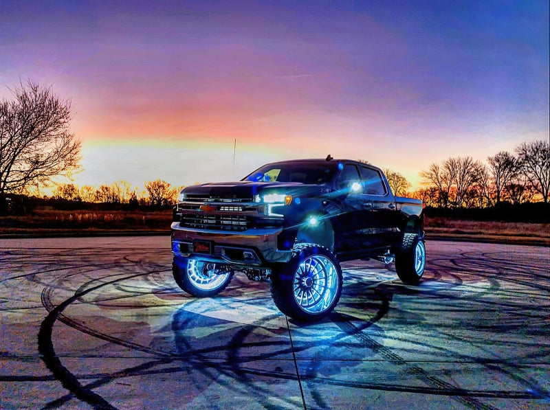 Oracle Lighting LED illuminated wheel rings with ColorSHIFT feature, showcasing vibrant multi-color LED light strips on a vehicle wheel.