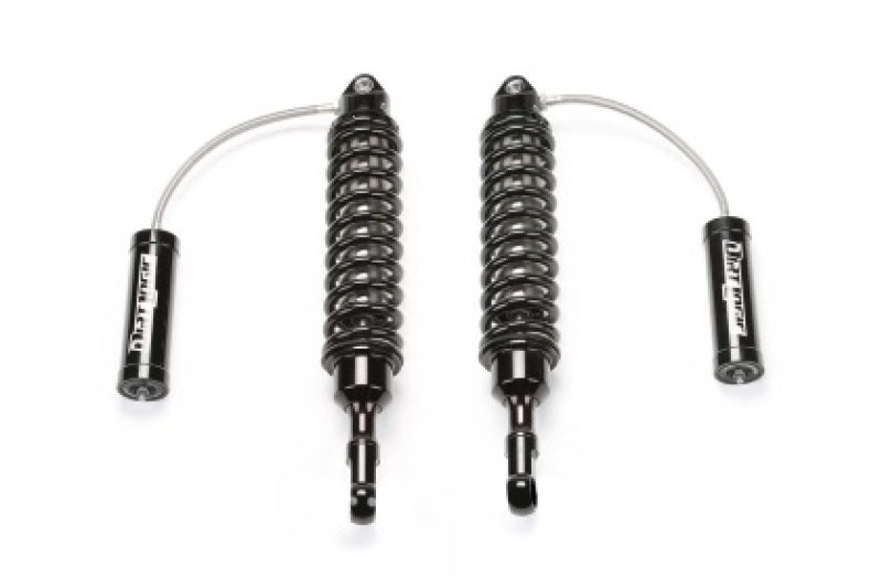 Pair of Fabtech Jeep JL/JT 5-inch Dirt Logic 2.5 Reservoir Coilovers showing adjustable shocks with coil springs for off-road suspension.