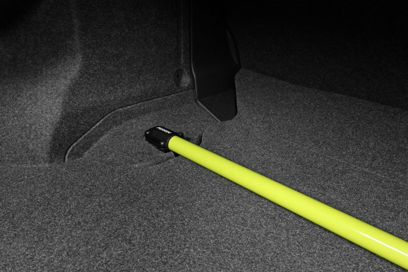 Perrin Performance neon yellow rear shock tower brace for 2015-2021 Subaru WRX and STI, stabilizes suspension and improves handling.