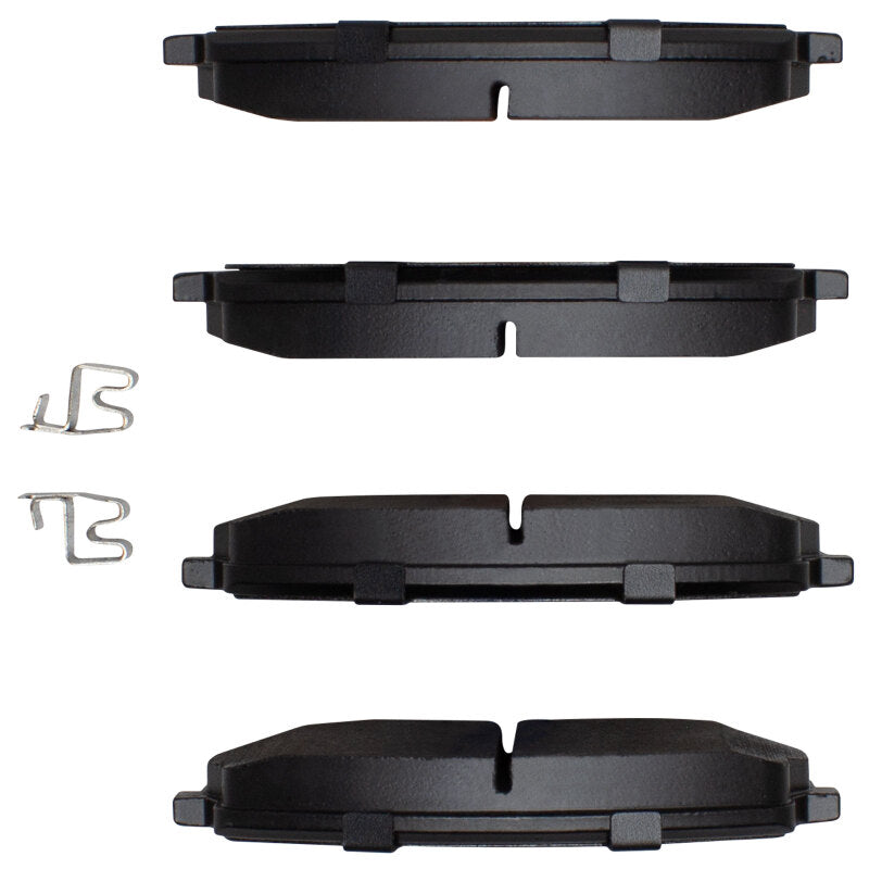 R1 Concepts Chevrolet Tracker front R1 Optimum OE brake pads, compatible with 1996-2008 models, showing new brake pad set.