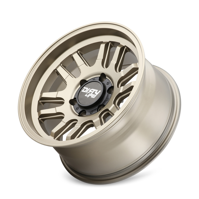 Dirty Life Canyon 17x9 Satin Gold cast wheel with 6x135 bolt pattern, 0mm offset, and 87.1mm hub in close-up view.
