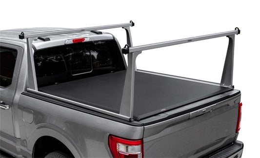 Access ADARAC 17-24 Nissan Titan ladder truck rack in silver mounted on a truck bed for hauling equipment.