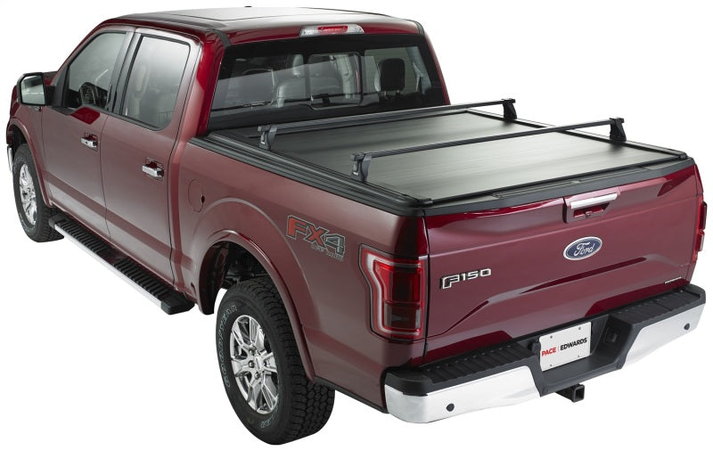 Pace Edwards UltraGroove retractable metal bed cover on a 2017 Ford F-Series Super Duty with 6ft 9in bed, installed on truck bed.