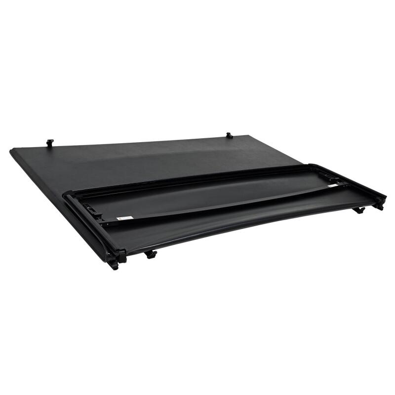 Westin soft tri-fold tonneau cover on a 2024+ Toyota Tacoma 74-inch bed, protecting the truck bed from weather and debris.