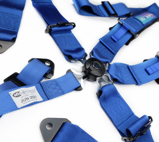NRG 5-point 3-inch blue seat belt harness with cam lock for racing and safety in automotive applications.