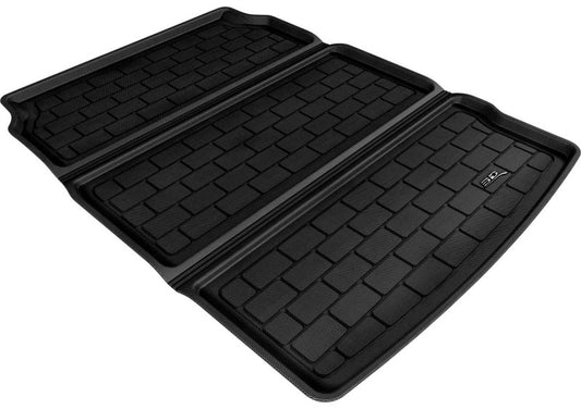 Black 3D MAXpider rubber cargo liner for BMW 5 Series (2011-2016), designed to protect the trunk floor with durable, custom-fit mats.