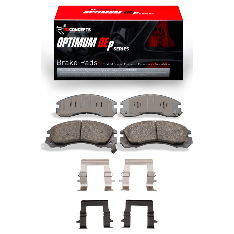 R1 Concepts Mitsubishi Montero 1994-2000 front OE brake pads and hardware kit, showing new brake pads with hardware components.