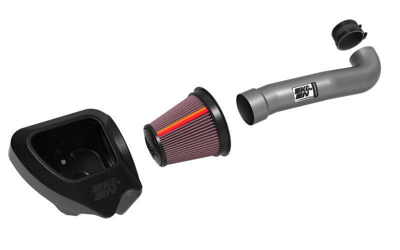 K&N Engineering aluminum cold air intake installed in a 2012-2018 Jeep Wrangler NextGen model, showing the sleek intake tube and filter.