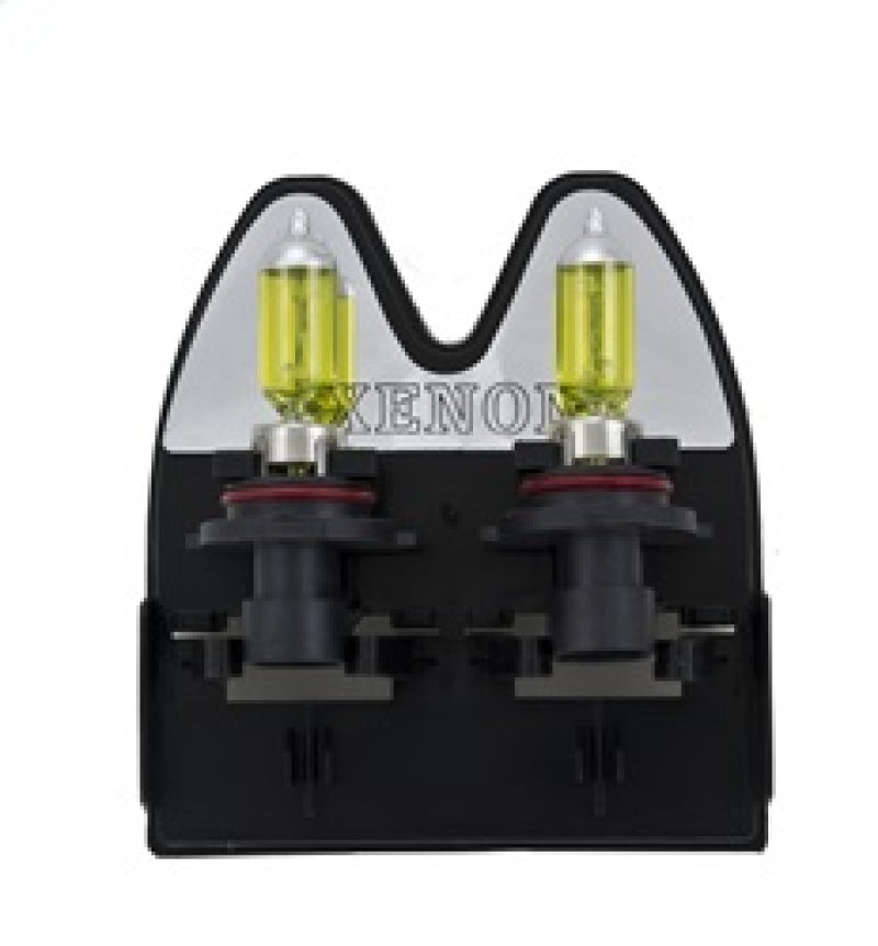 Hella 9006XS 12V 55W Xen Pure yellow automotive bulb, pair of headlight bulbs with yellow tint for enhanced visibility.