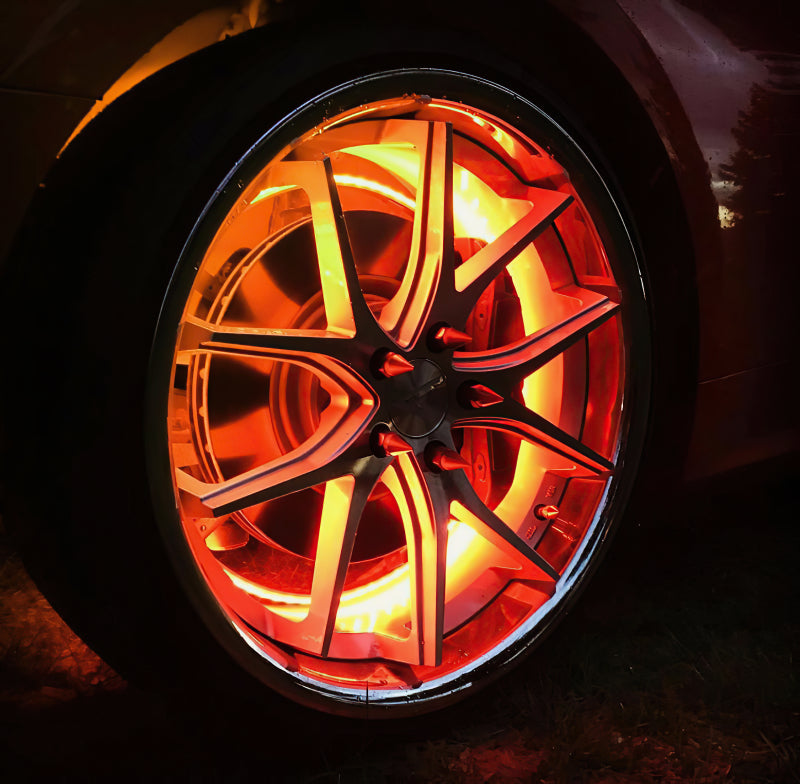 Oracle Lighting LED illuminated wheel rings with ColorSHIFT technology, showcasing vibrant, customizable light strip for vehicle wheels.