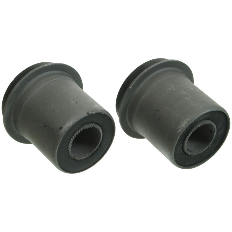 Moog front lower control arm bushing kit for 1973-1974 Chevrolet C10 pickup suspension, featuring rubber bushings.