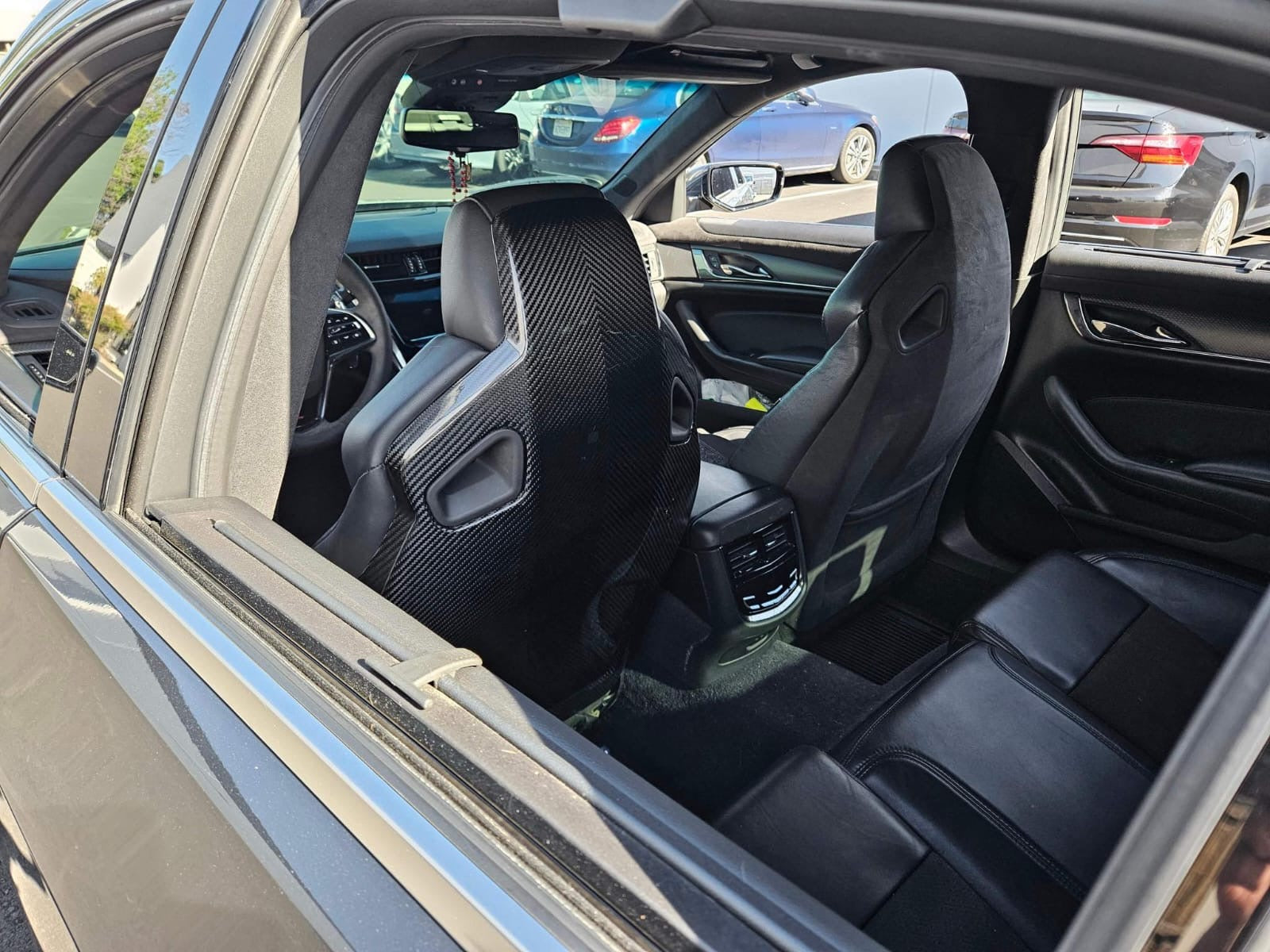 Cadillac ATS-V sedan Recaro carbon fiber seat rear panel cover replacement for driver and passenger seats by Street Driven Performance.