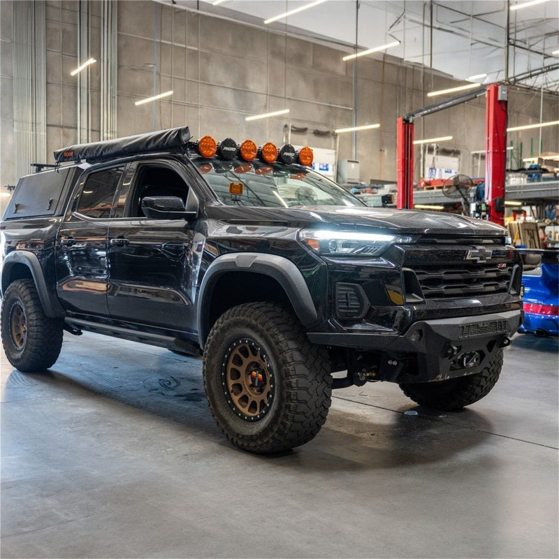 Rigid Industries Chevrolet Colorado GMC Canyon D-SS light bar kit with LED light bars and cubes for off-road illumination.