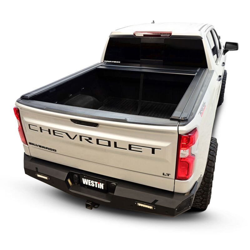 Westin roll-up manual retractable tonneau cover in black on a Silverado/Sierra 1500 5ft 8in bed, showcasing its sleek design