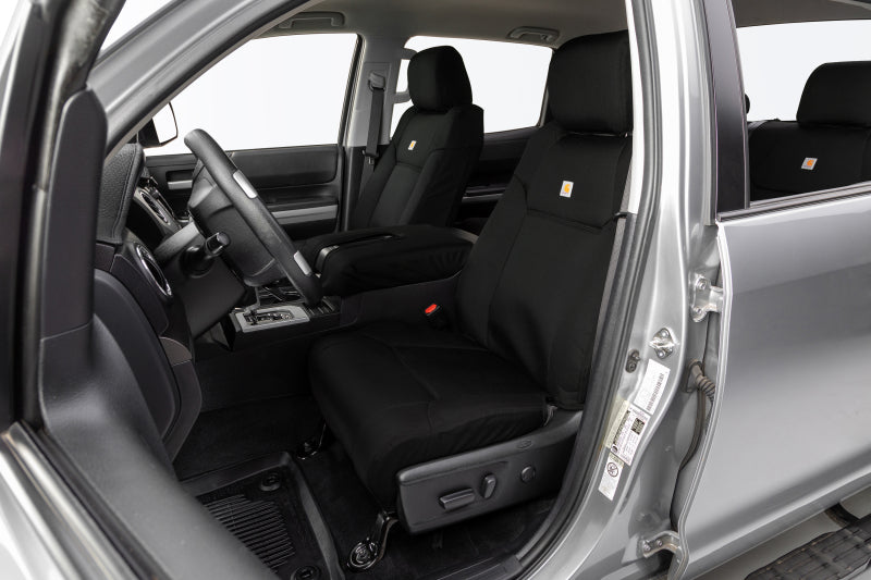 Covercraft Carhartt Super Dux custom second row seat cover fitted on a Toyota Grand Highlander, durable fabric with precise fit and stitching.