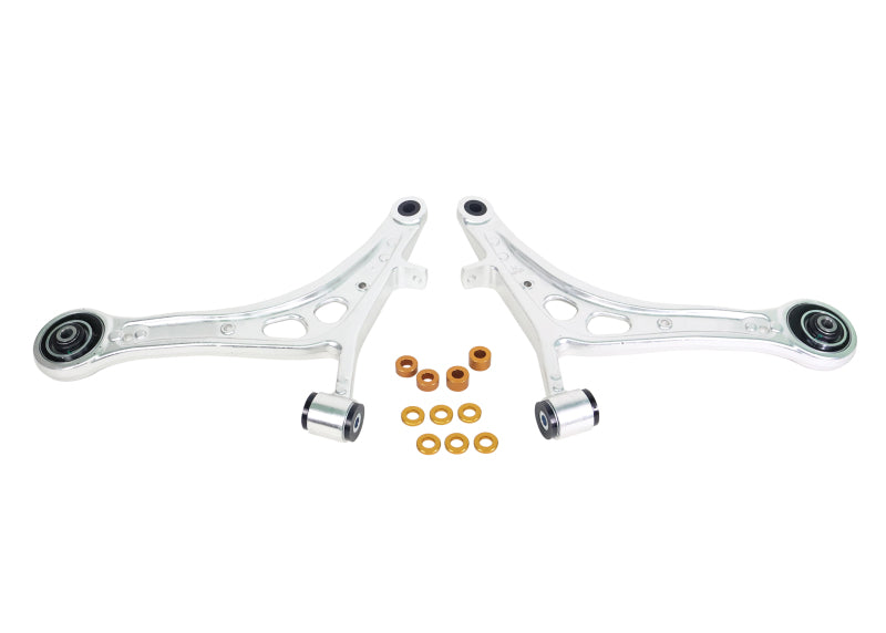Whiteline front lower control arms with caster correction for 2017-2021 Subaru WRX and STI, showing the durable metal construction.