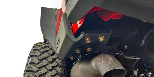 DV8 Offroad Jeep Gladiator 2019+ bedside sliders, exterior body armor and rock rails, mounted on the vehicle's side for protection.