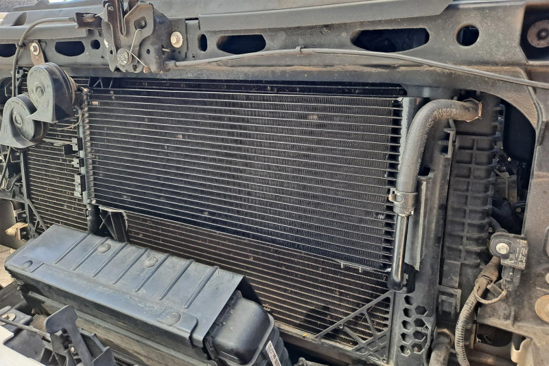 CSF transmission oil cooler for Ford F-150 and Raptor, showing the aluminum cooling fins and mounting brackets.
