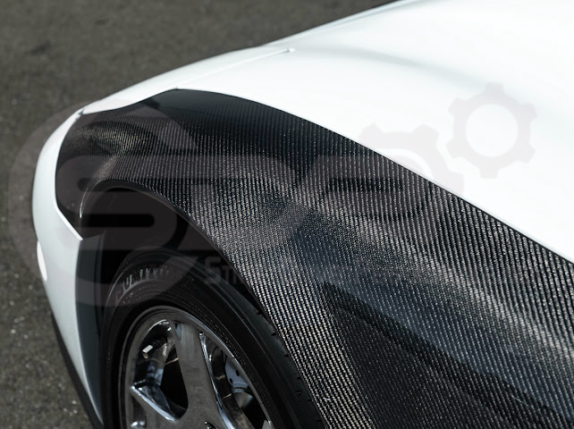 Factory style carbon fiber front and rear widebody fenders for 1997-2004 Chevrolet Corvette C5 hatchback by Street Driven Performance.