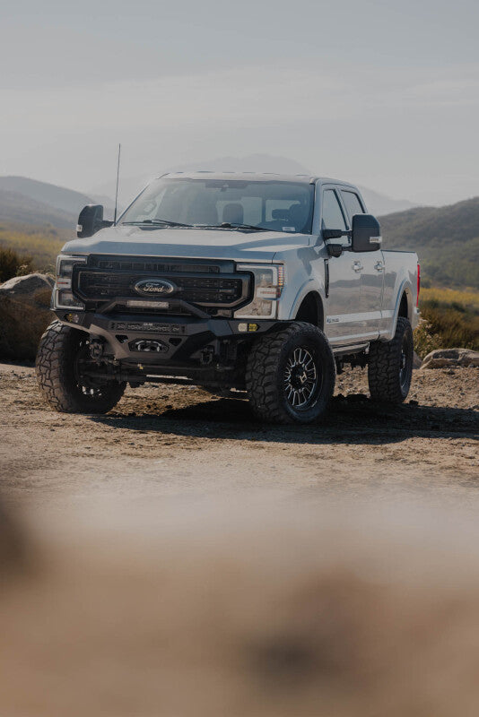 Steel front bumper for Ford Super Duty F-250/F-350 from DV8 Offroad's Spec Series, designed for durability and off-road protection.