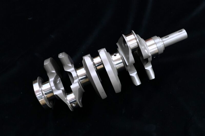 HKS G16E 1.75L Step3 crankshaft for high-performance engines, shown in a close-up image with detailed metal components.