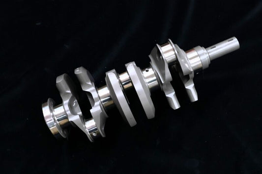 HKS G16E 1.75L Step3 crankshaft for high-performance engines, shown in a close-up image with detailed metal components.
