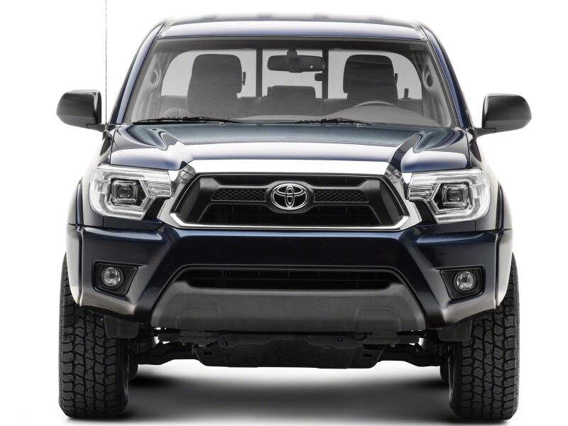 Raxiom Toyota Tacoma axial series projector headlights in chrome with clear lens, designed for 2012-2015 models.