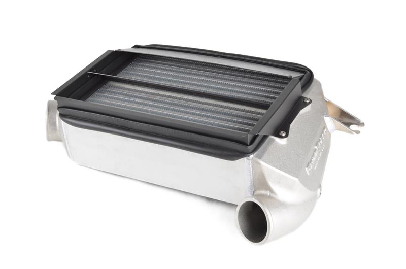 GrimmSpeed 15-21 Subaru WRX top mount intercooler kit installed in engine bay, showcasing large aluminum intercooler core and mounting brackets.