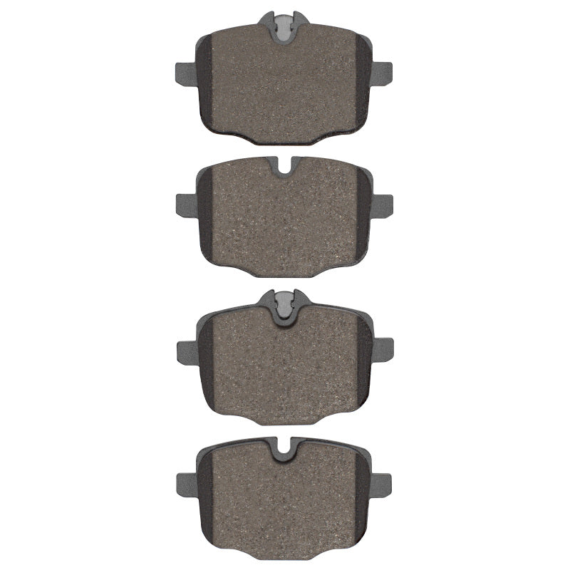 R1 Concepts ceramic brake pads for BMW 650i coupe 2011-2019 rear OE brake pads, showing the brake pad set with mounting hardware.