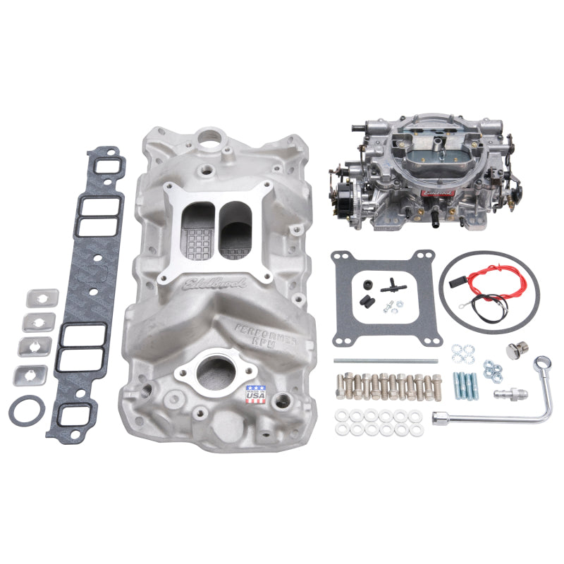 Edelbrock Performer RPM small block Chevrolet intake manifold and carb kit with natural finish for 1957-1986 engines.
