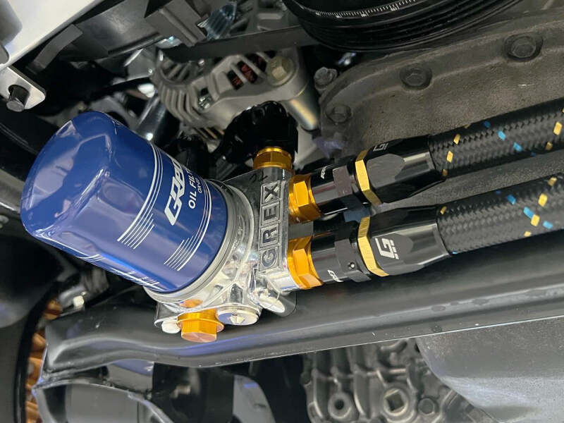 GReddy AN12 REUSABLE HOSE NYLON BRAIDED BLACK/GOLD/BLUE (PRICED PER FOOT)